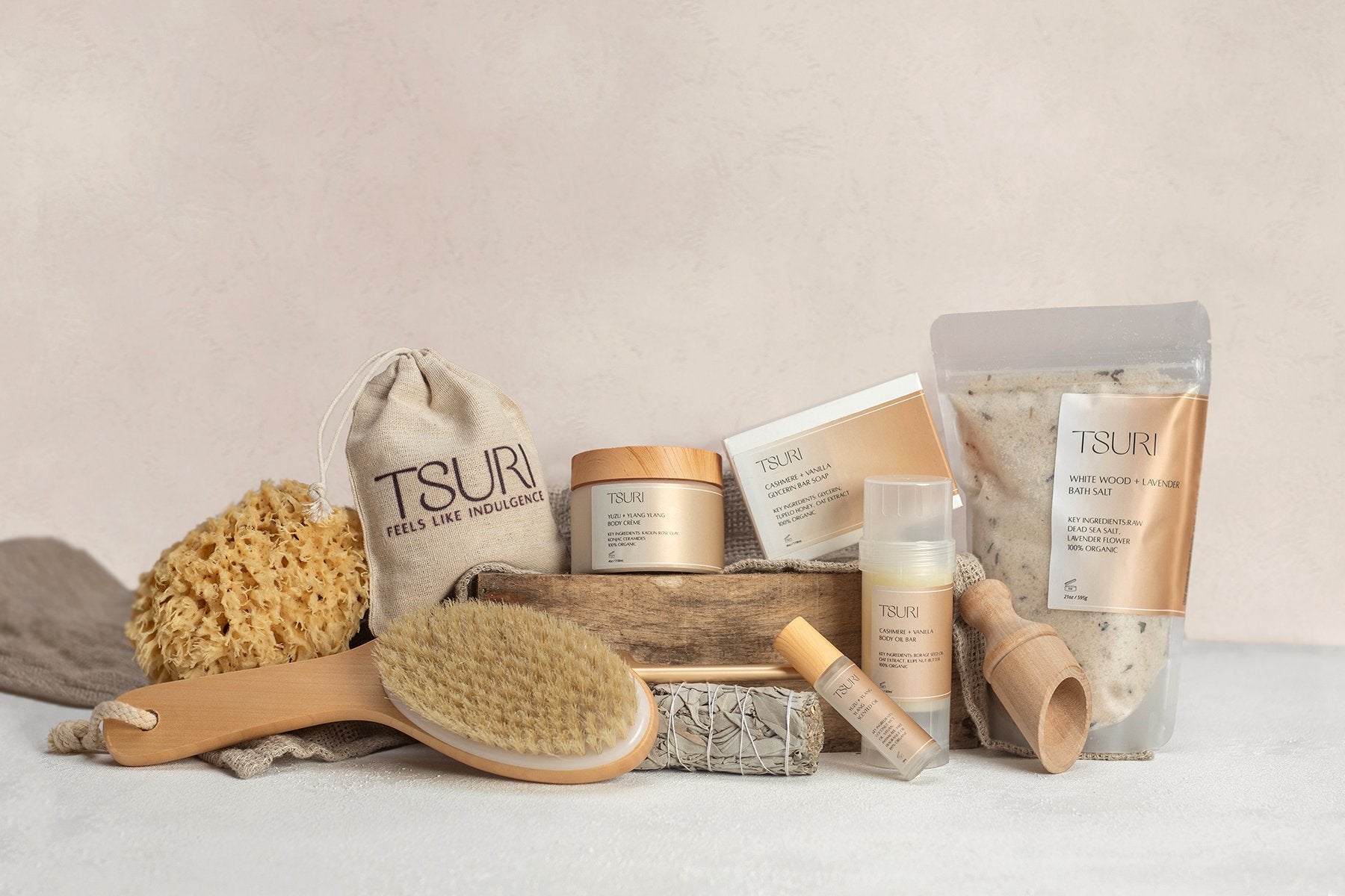Tsuri Bath Ritual Kit featuring calming body care essentials with botanicals, oils, and accessories for relaxation and detoxification.