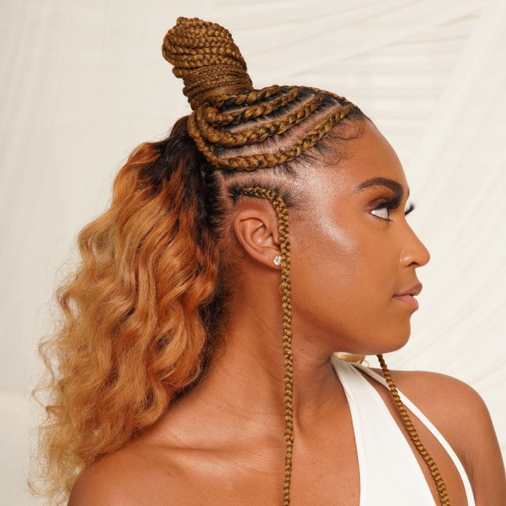Woman with styled braids using 28" hypoallergenic braiding hair, showcasing textured and intricate braid design.