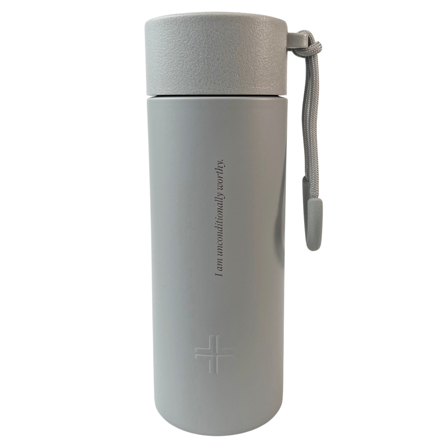 Suplmnt x Lushness 24oz Affirmation Bottle in earth tones with "I am unconditionally worthy" engraving, eco-friendly design.