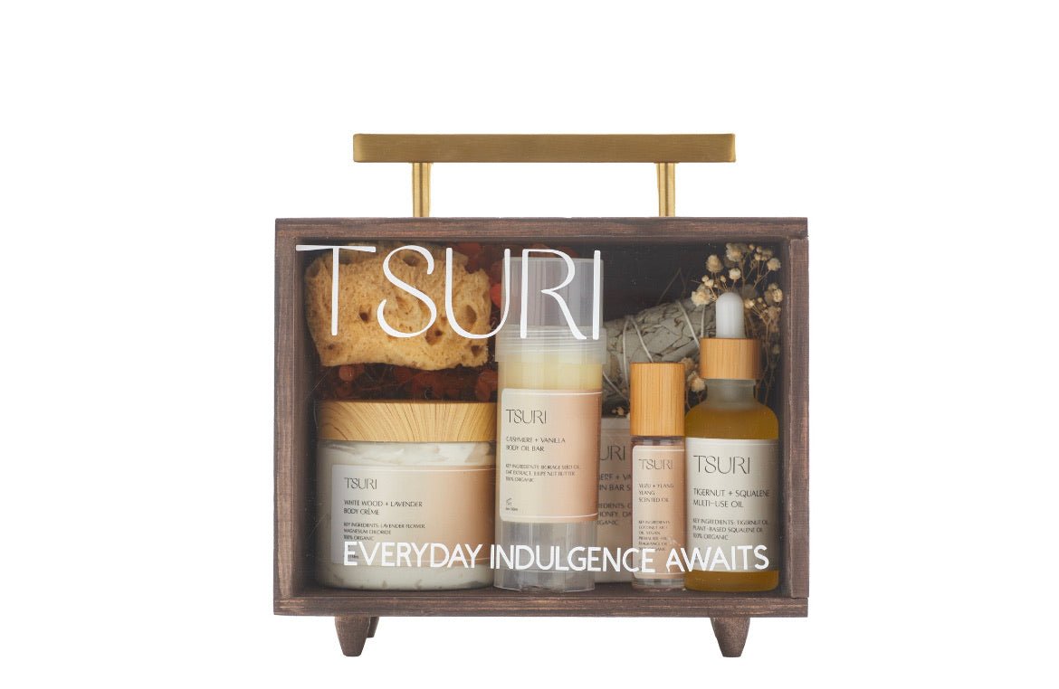 Limited Edition Ritual Kit by The Tsuri Company featuring body creams, oils, soaps, and bath accessories for self-care and relaxation.