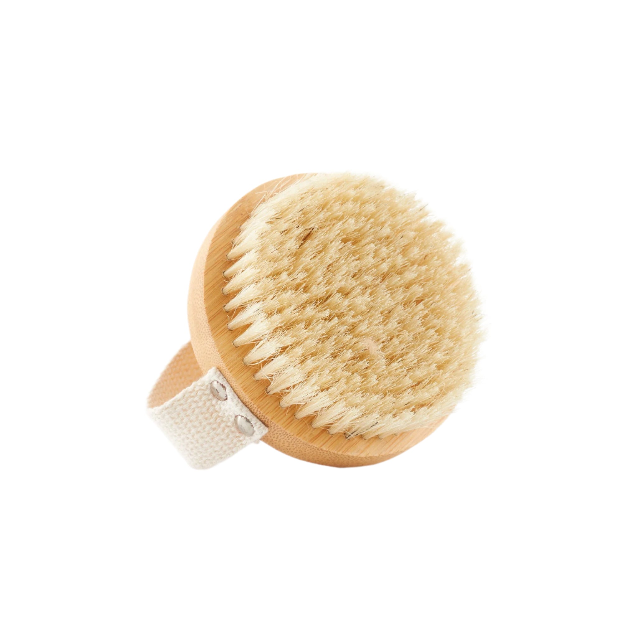 Detoxifying natural bristle body brush for exfoliation, lymphatic drainage, and circulation boosting spa treatment.
