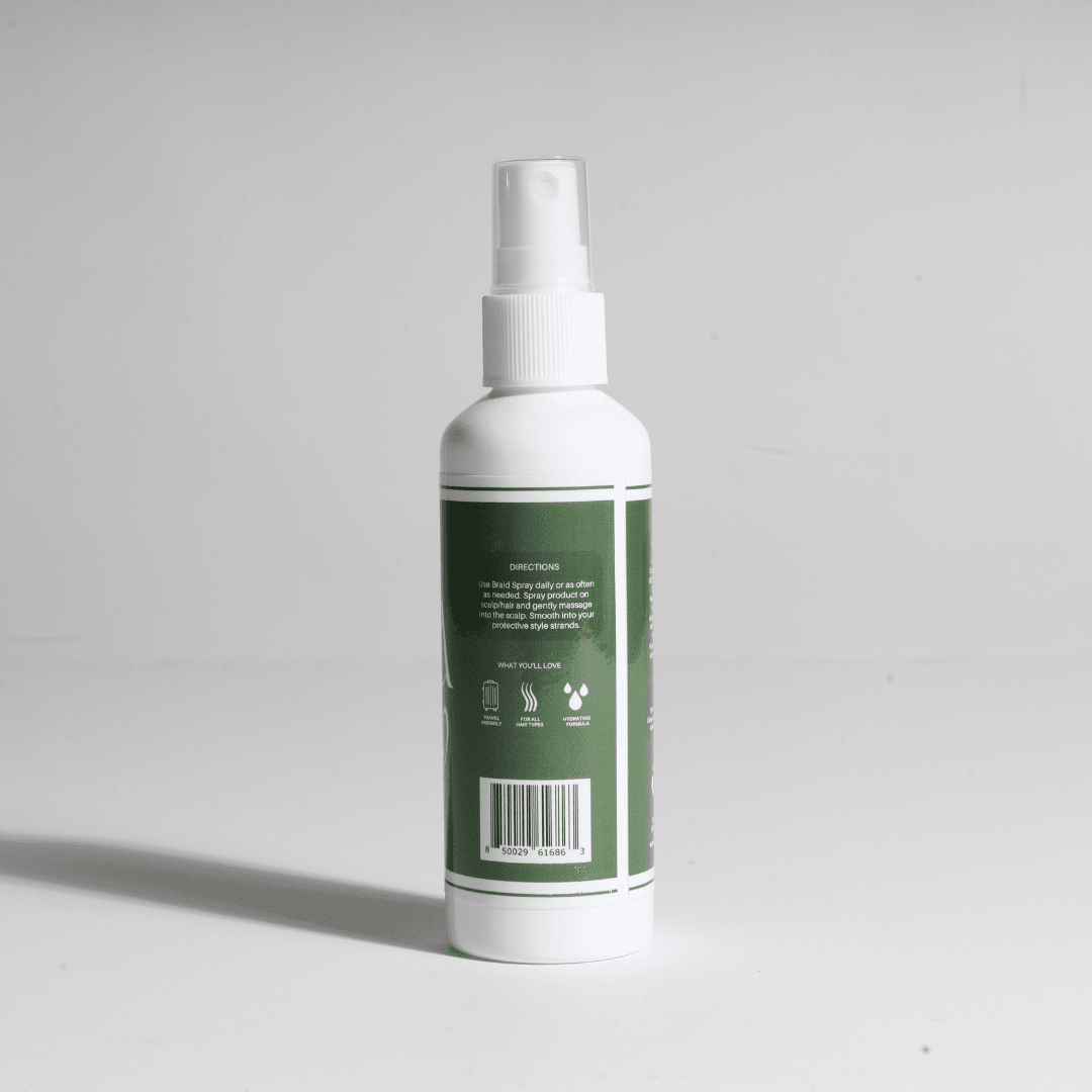 Bottle of Rice Water Braid Spray for moisture and strength in hair care.