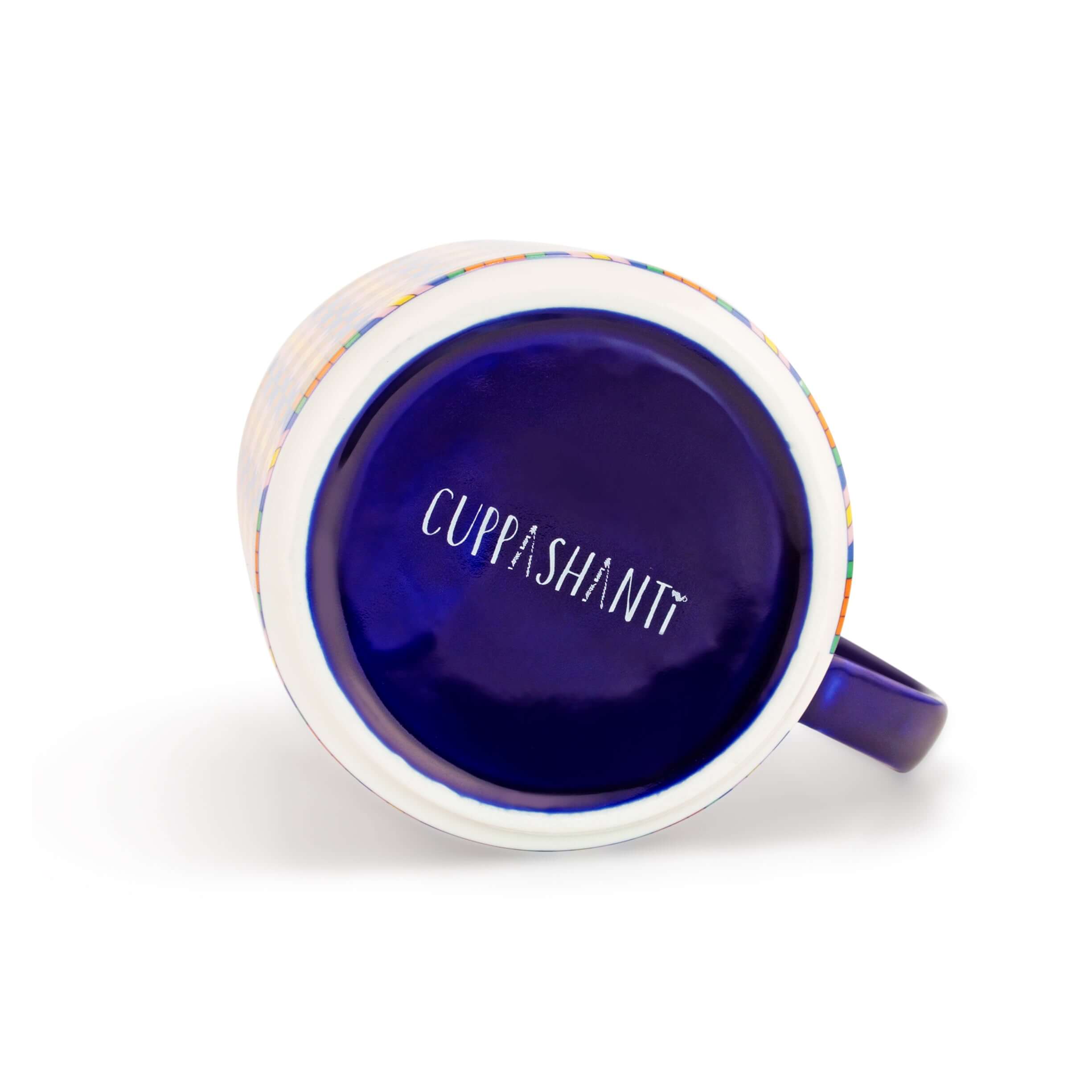 Bottom view of Colorful Prosperity Mug showing vibrant blue interior and 'Cuppashanti' logo, part of the Kentemania Collection.