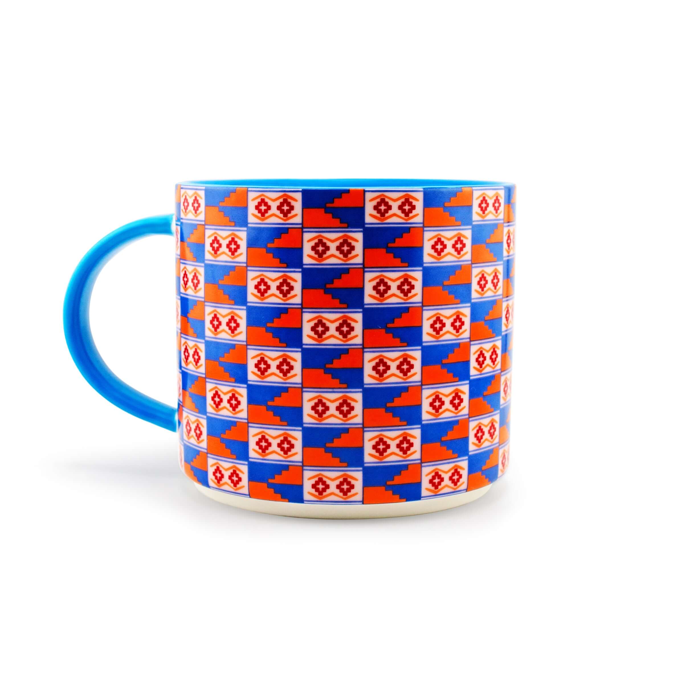 Kente-inspired colorful mug with blue handle and vibrant patterns symbolizing growth and prosperity.